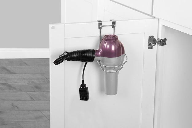 Hair dryer holder over the clearance door